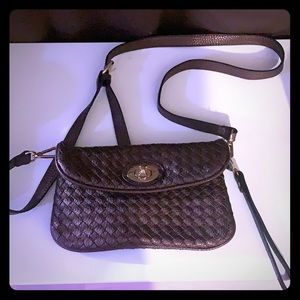 Crossbody convertible to  wristlet!